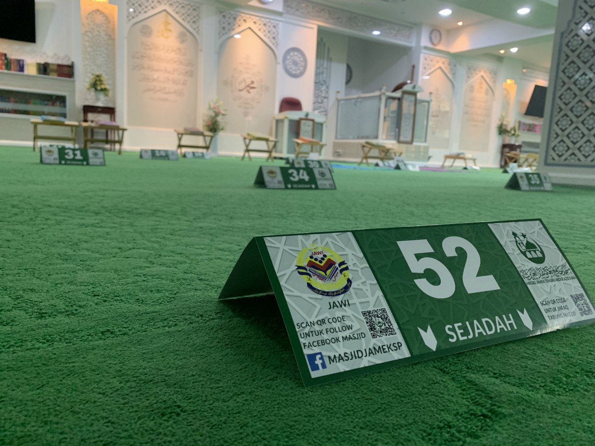 Social distancing for prayers in the Masjid Jamek Tengku Abdul Aziz Shah at Kampung Penchala.